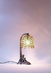 Lampe Ambre Veneto Treviso femme assise en Bronze