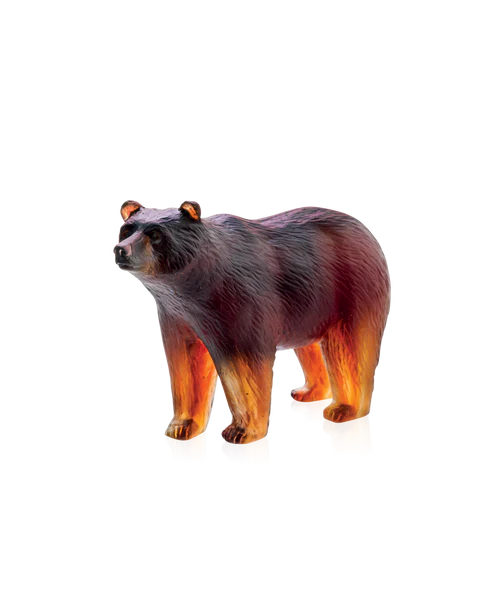 Sculpture d'un ours en pâte de verre, de la prestigieuse cristallerie Daum. Couleur ambre foncé.