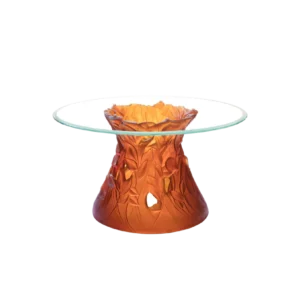 Table basse en pâte de verre de la prestigieuse cristallerie Daum, collection Végétale. Couleur ambre, avec un plateau en verre trempé.