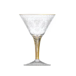 Verre à martini 150ml en authentique cristal de bohême taillé main, gravé artistiquement, et subtilement décoré avec des feuilles en or 24 carats peintes à la main. Collection Maharani de Moser, la plus prestigieuse & réputée cristallerie de Bohême.