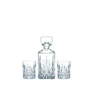 Ensemble composé d'une carafe à whisky accompagnée de ses 2 verres. Ensemble en cristallin de la Maison bavaroise Nachtmann, collection Noblesse.